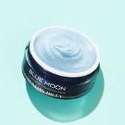 Tidal Brightening Cream, dark blue open jar showing light blue sugar like balm.